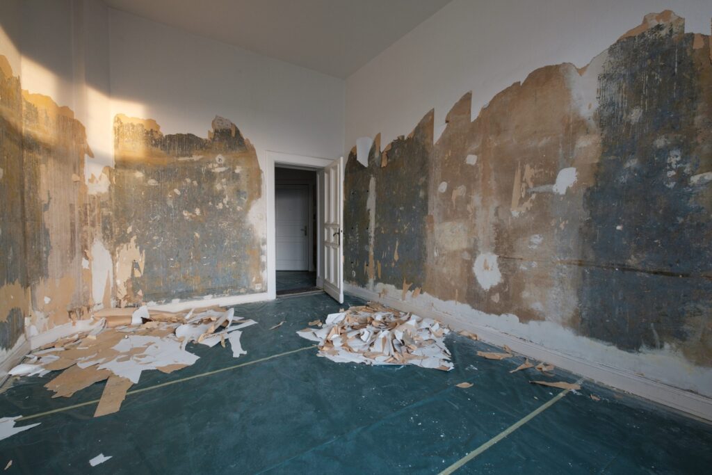 empty room during flat renovation, renovate home, removing wallpaper -